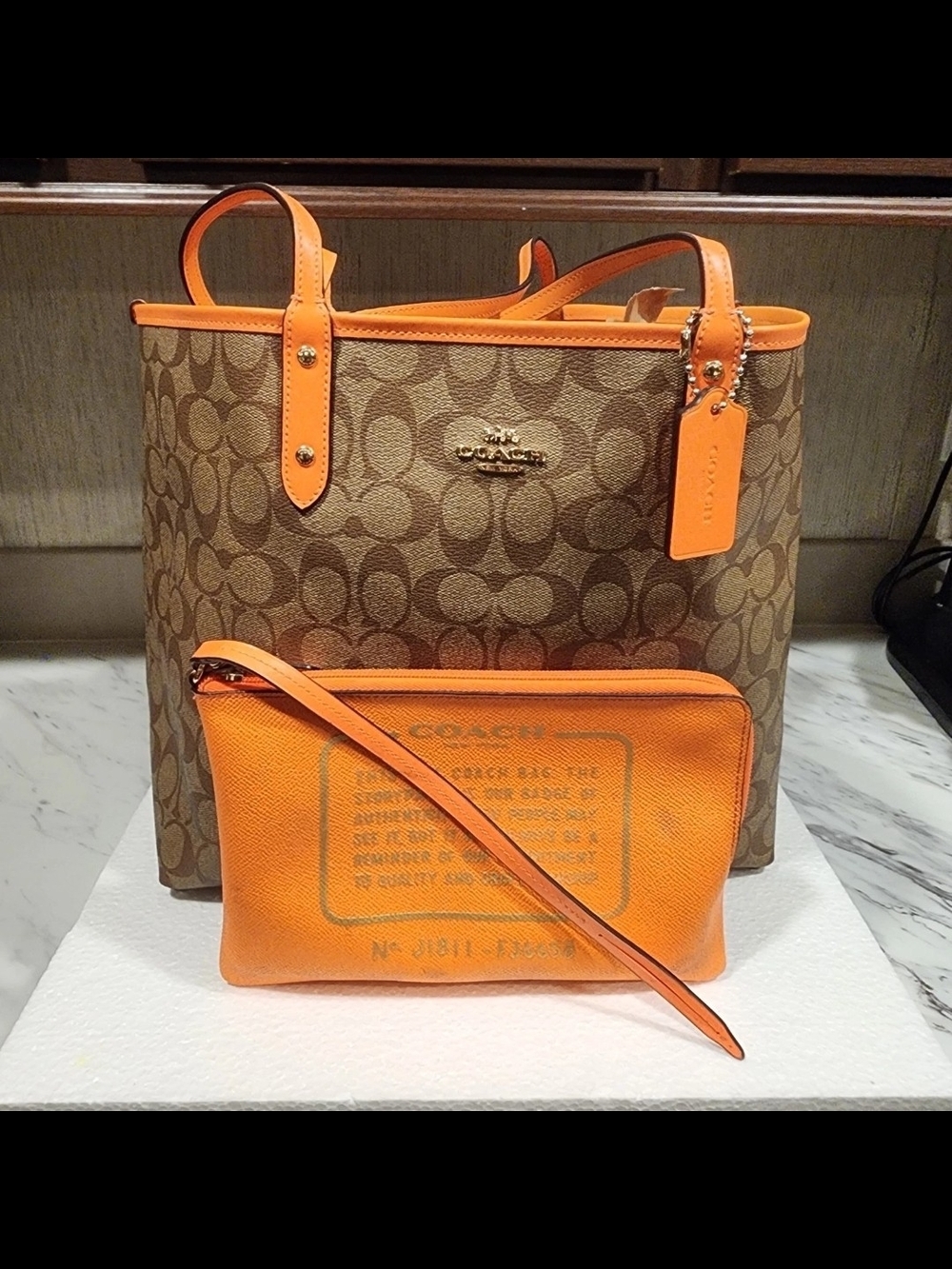 Coach Brown Signature Tote with Bright Orange Trim and Pouch